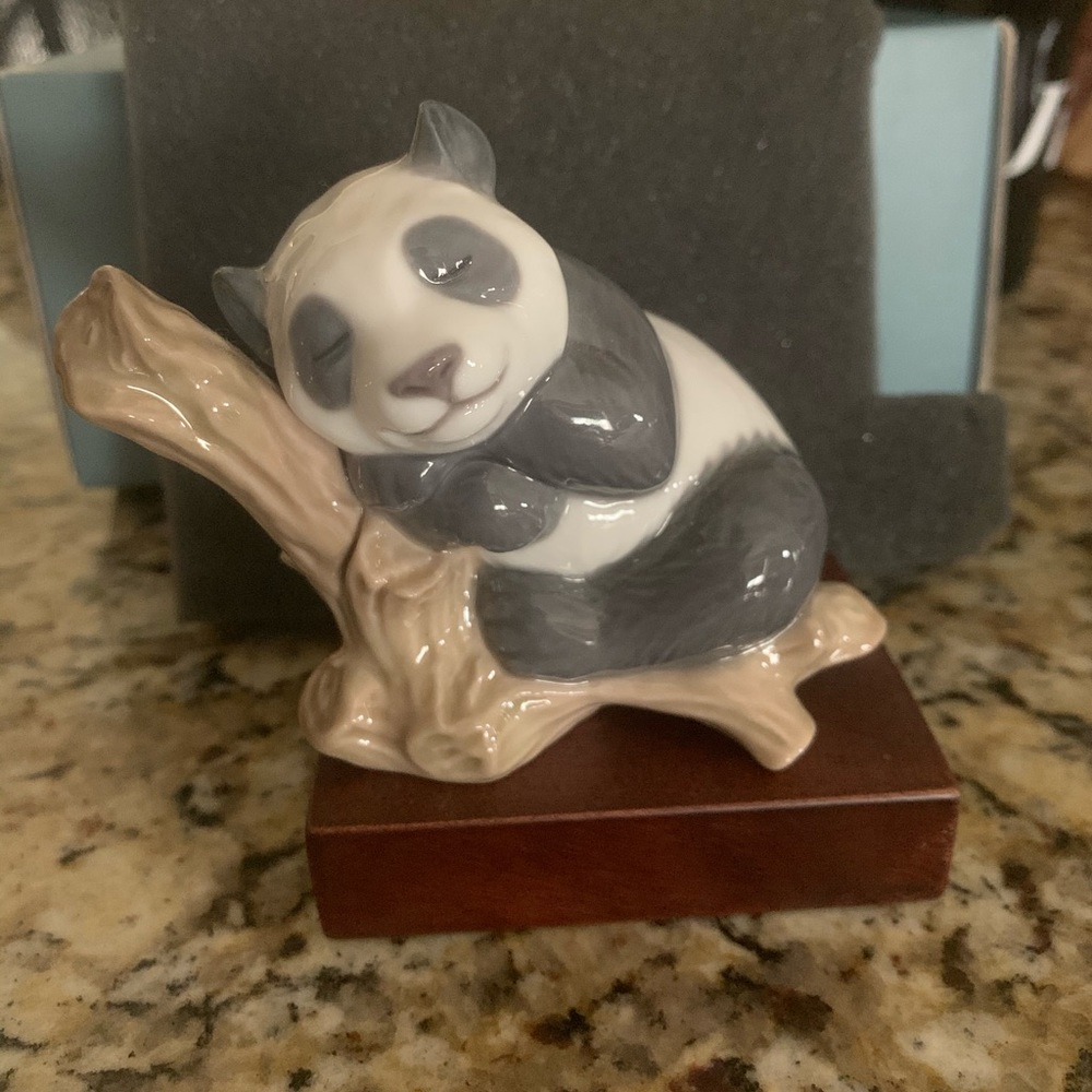 Lladro lucky sleeping panda on branch